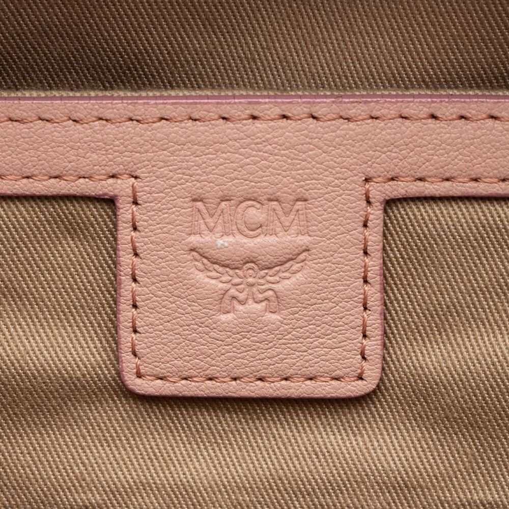 Mcm Embossed Leather Small Backpack - image 7